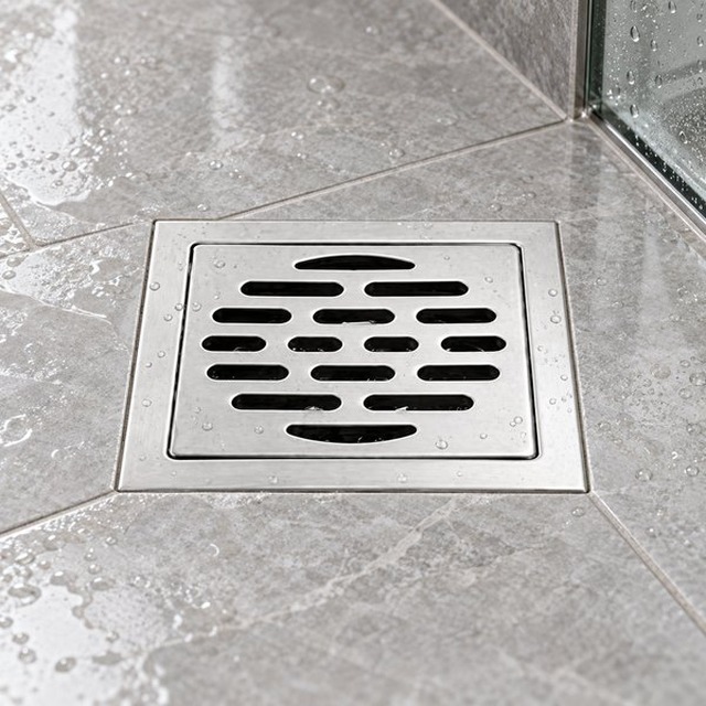 JOMOLA 100 x 100 mm stainless steel floor drain